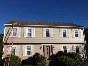 Wayland Roofing - Finished metal roof - side view of the house