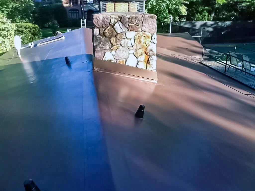 Large chimneys with flashing and anti-leak protection