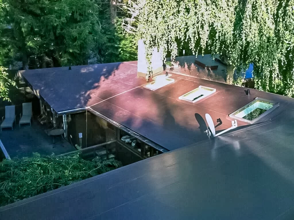 Three Skylights - Flat roof with 80-mil Brown IB Roof Systems PVC