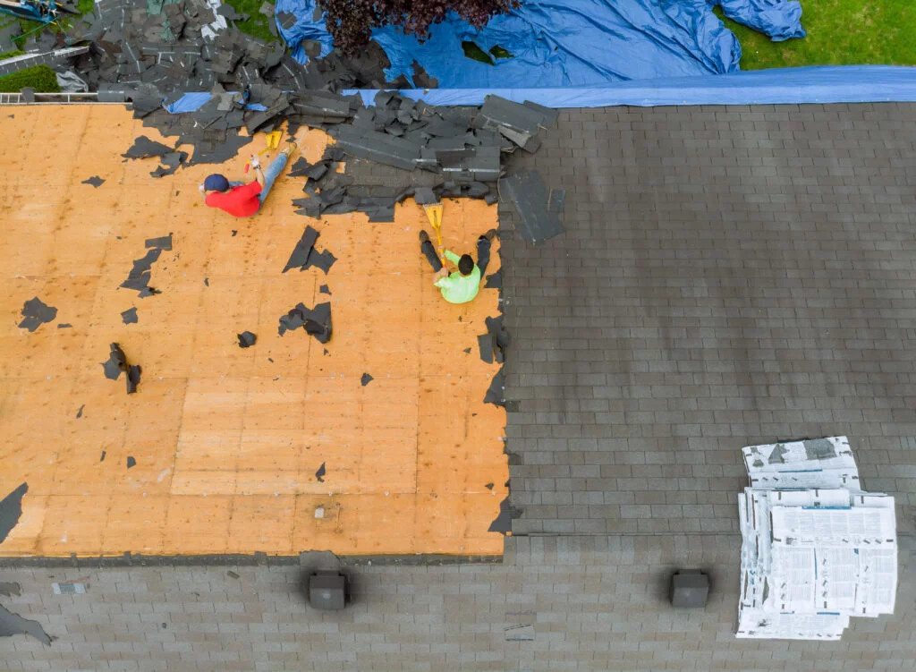 Removal of old roof replacement of an apartment building