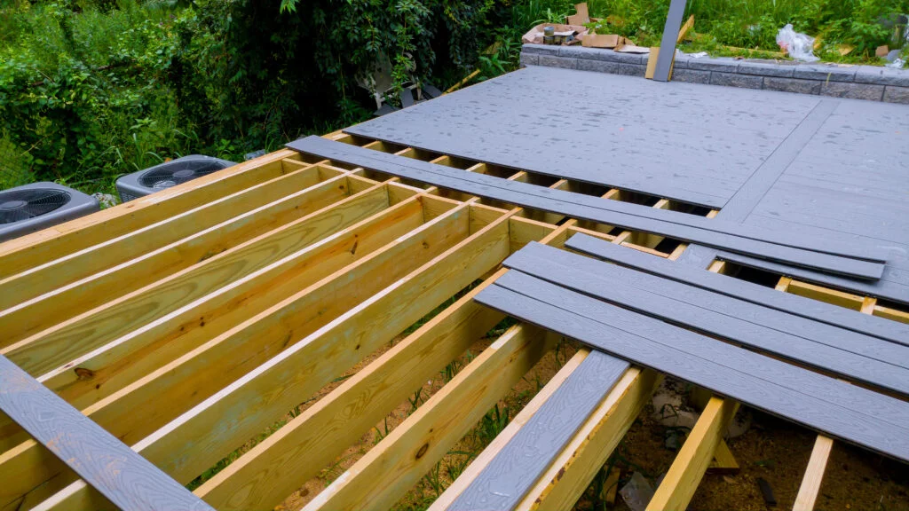A new wooden, timber deck being constructed completed can be seen on the decking. Under deck roofing