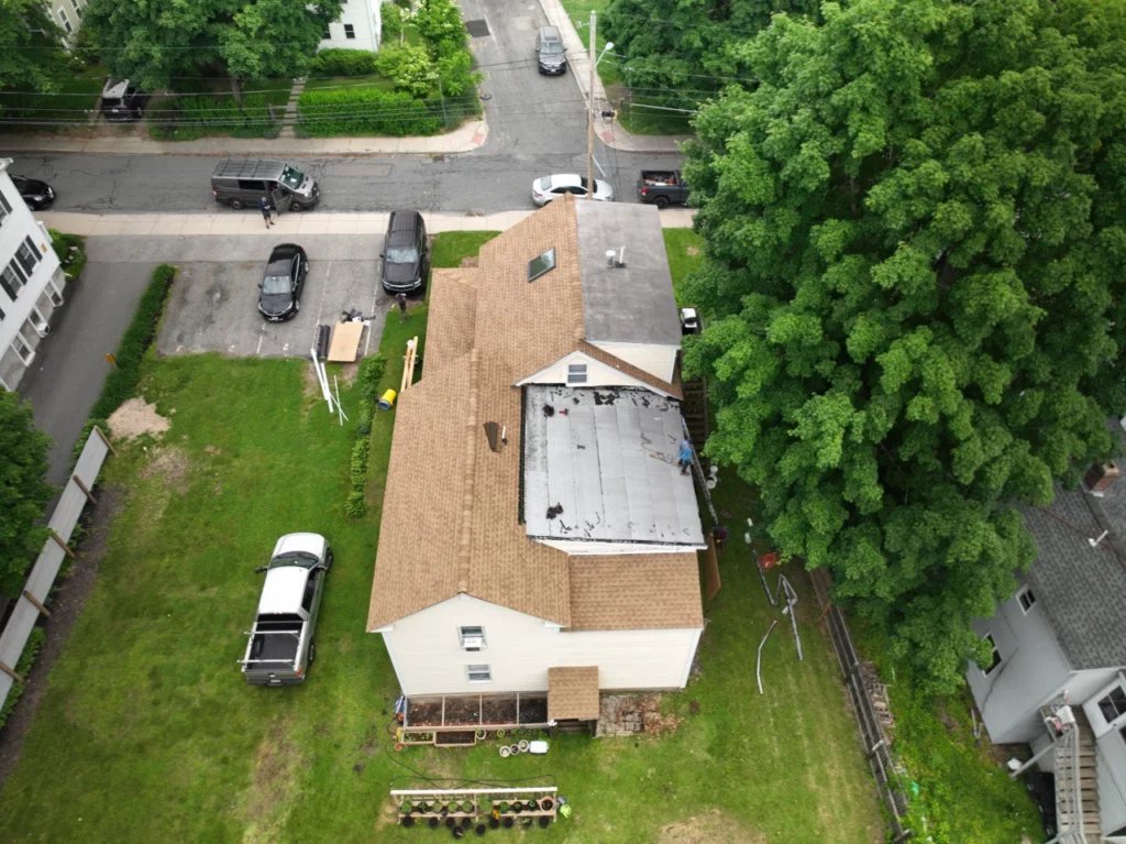 General View 8 Cross Street, Westborough, Massachusetts, with partially flat roof - 1st step of PVC flat roof replacement in Massachusetts