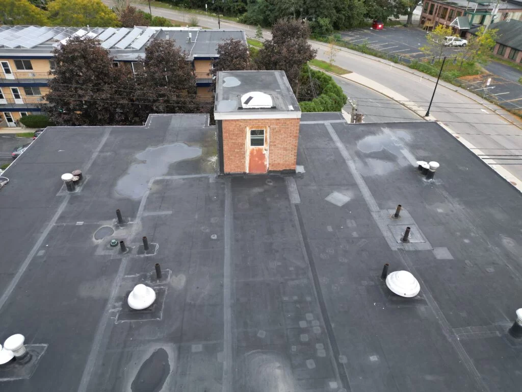 strip and reroof of 60-mil PVC roof at 790 Hyde Park Ave