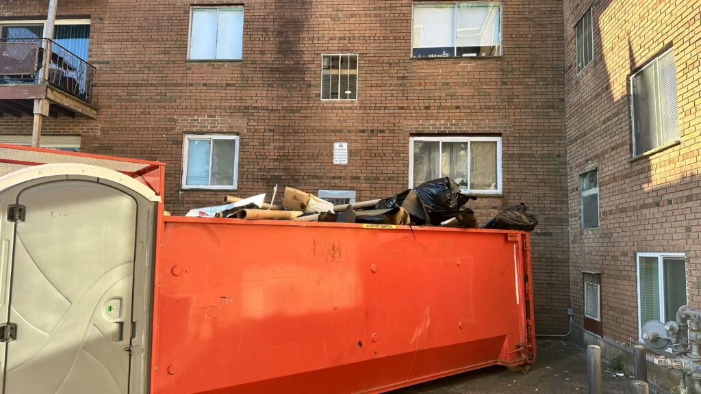 Dumpster at the construction site, 790 Hyde Park Ave