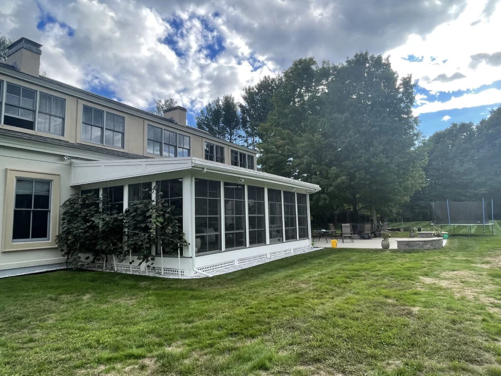Elegant home exterior with a new 3-season porch