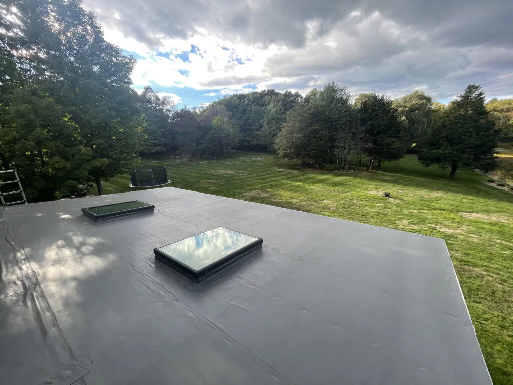 Energy-efficient roofing with skylights at 2 Gay Farm Way Westwood Roofing