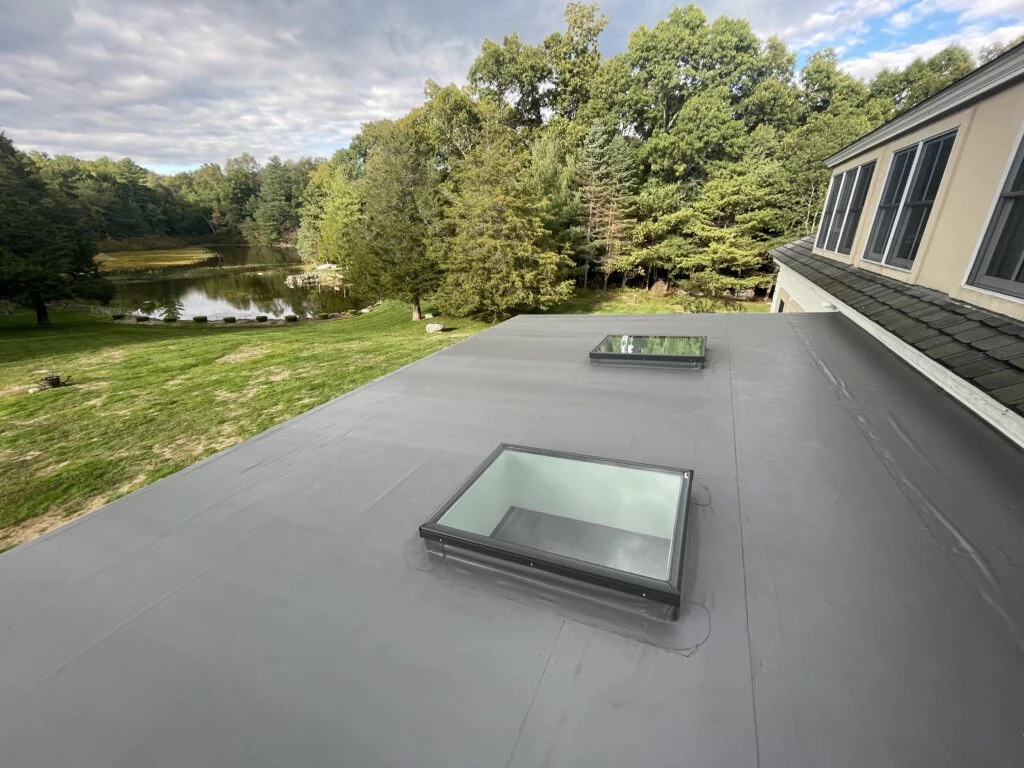 Flat roof with skylights at 2 Gay Farm Way Westwood Roofing