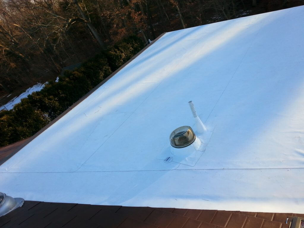 Aluminum shingles and PVC roof installation