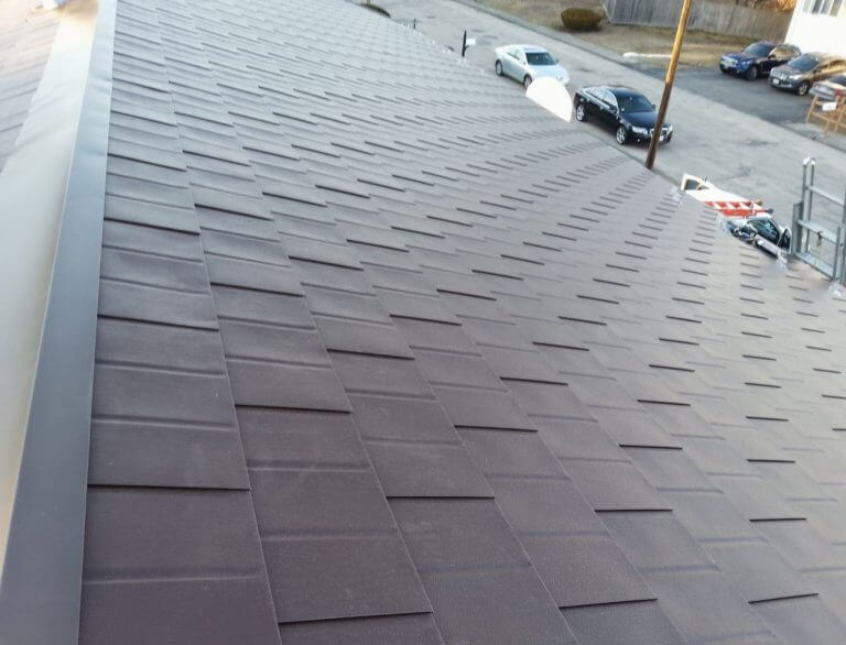 Aluminum shingles and PVC roof installation