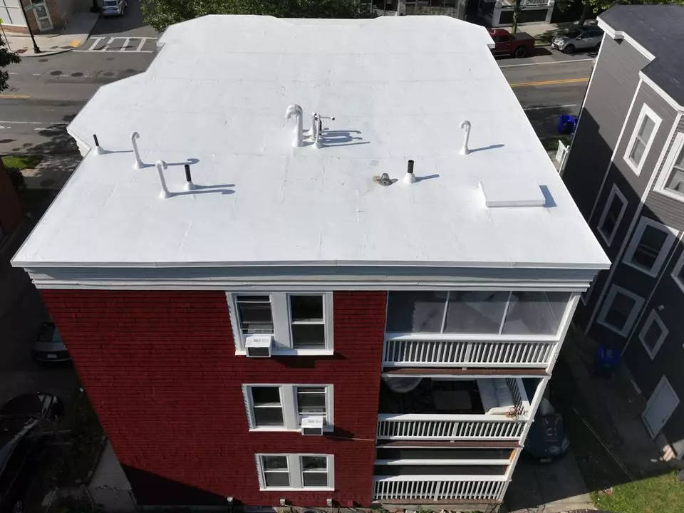 Apartment building, Boston, MA — white reflective roof membrane
