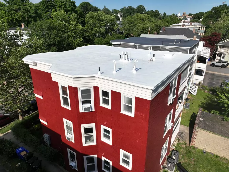 Apartment building, Boston, MA — white reflective roof membrane