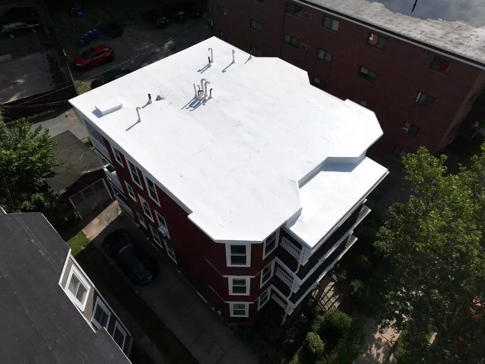 Apartment building, Boston, MA — white reflective roof membrane
